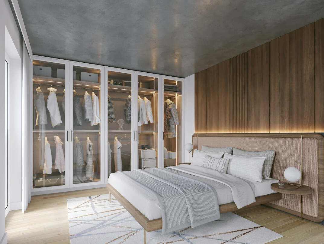 Bedroom with built-in wardrobe and neatly folded clothes