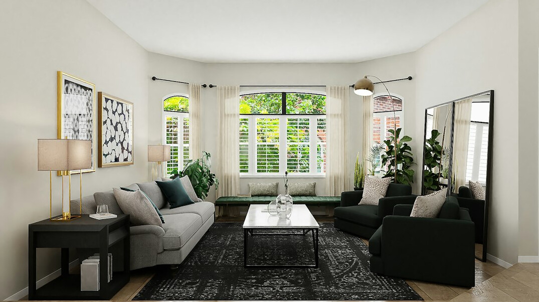 Spacious living room with large window and sofa