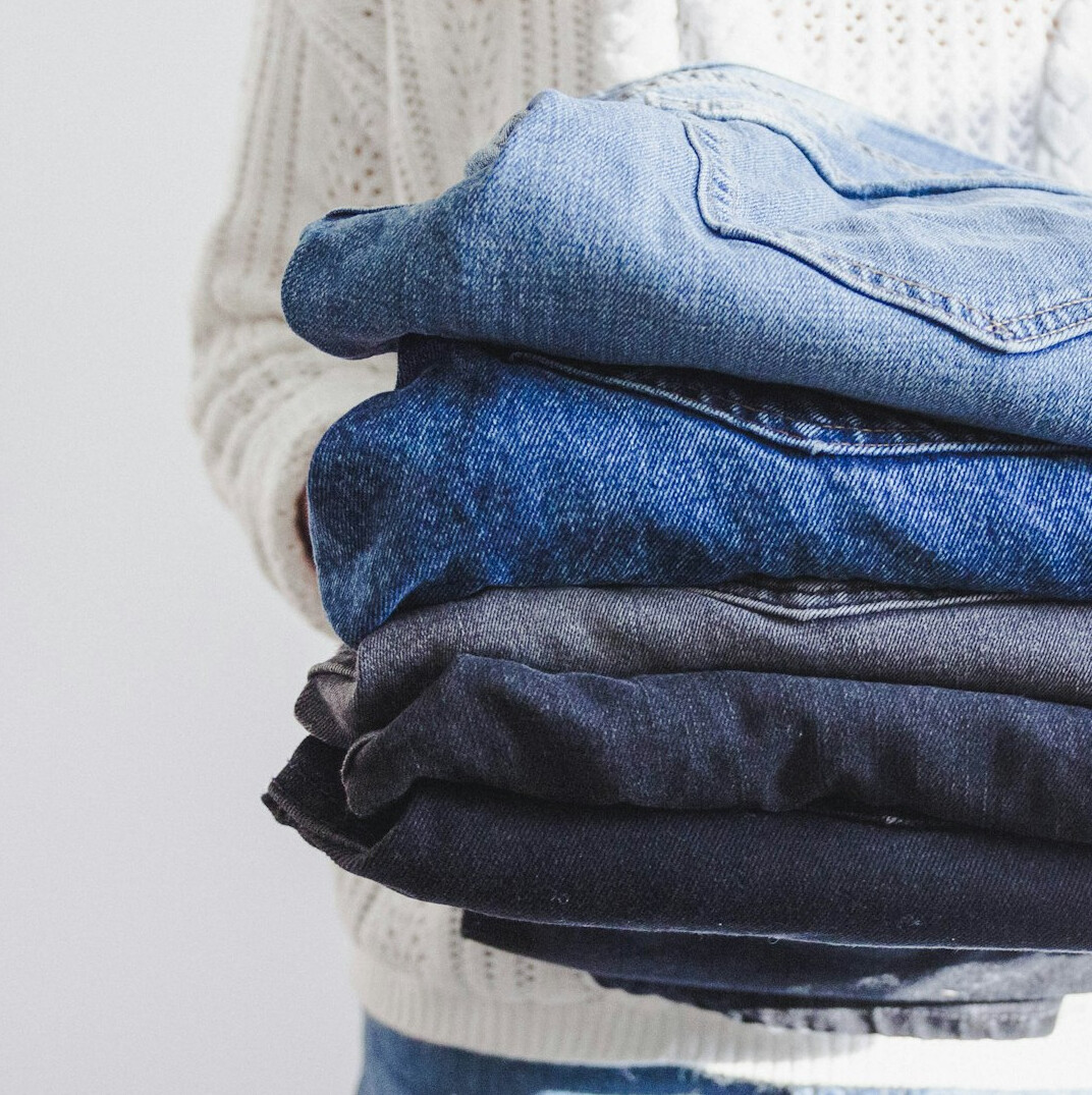 person folding laundry neatly